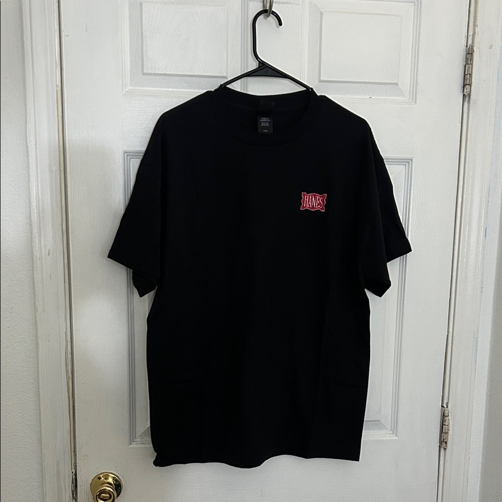 Hanes Black Tee with Red Logo “Skate is life” on the back. Never been worn